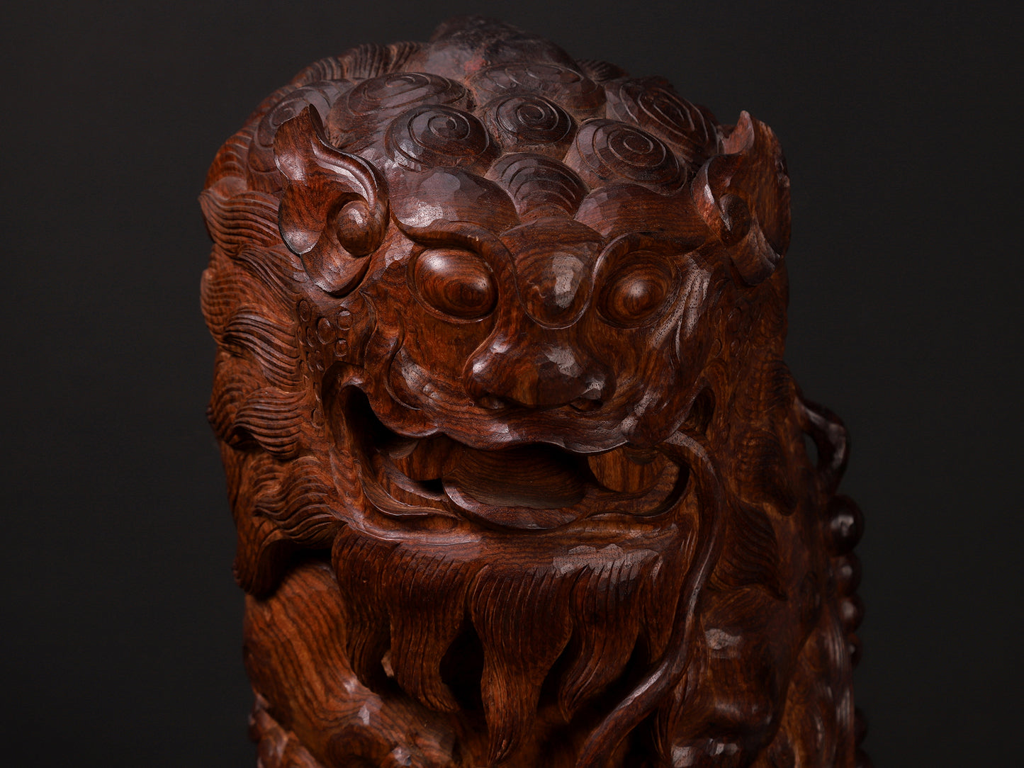 Chinese traditional handmade carving of lucky Pixiu, Dongyang intangible cultural heritage craftsmanship